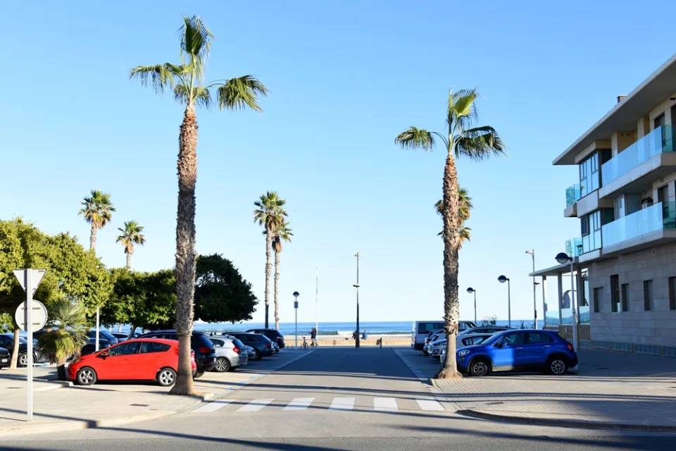 Cars parked at a beachfront building in Miami, Florida